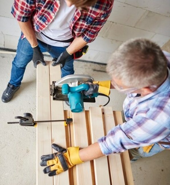 imgi_160_close-up-experienced-carpenter-his-younger-employee_329181-15661